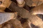 Esna Temple of Khnum — painted hypostyle hall sunk 9 metres below the modern town